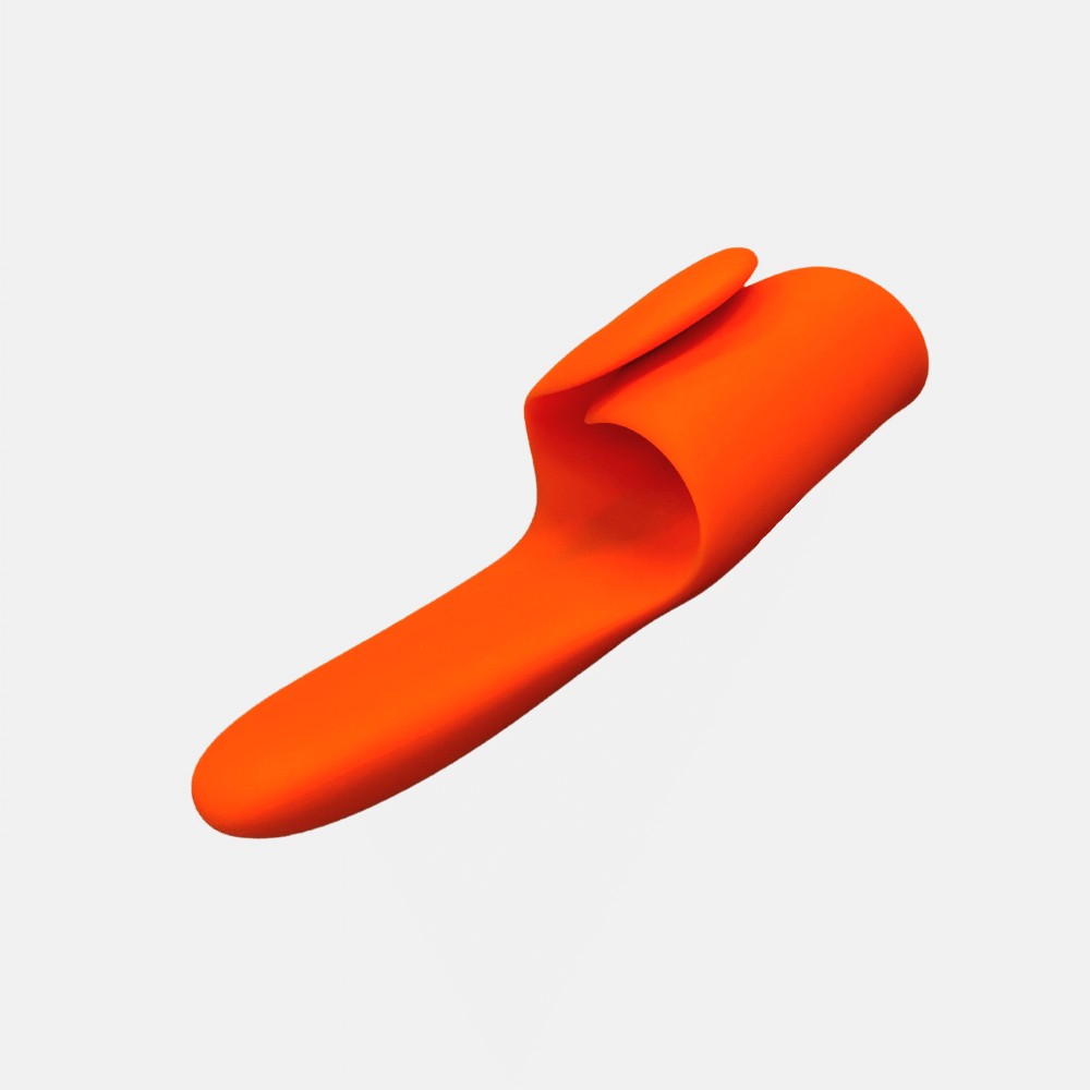 Image of the orange sex toy by LUDDI in the ‘closed’ position. The ZIGGY has a multi-use design that can be used in many ways to suit your abilities, gender, or experience. Learn more by visiting our online store.